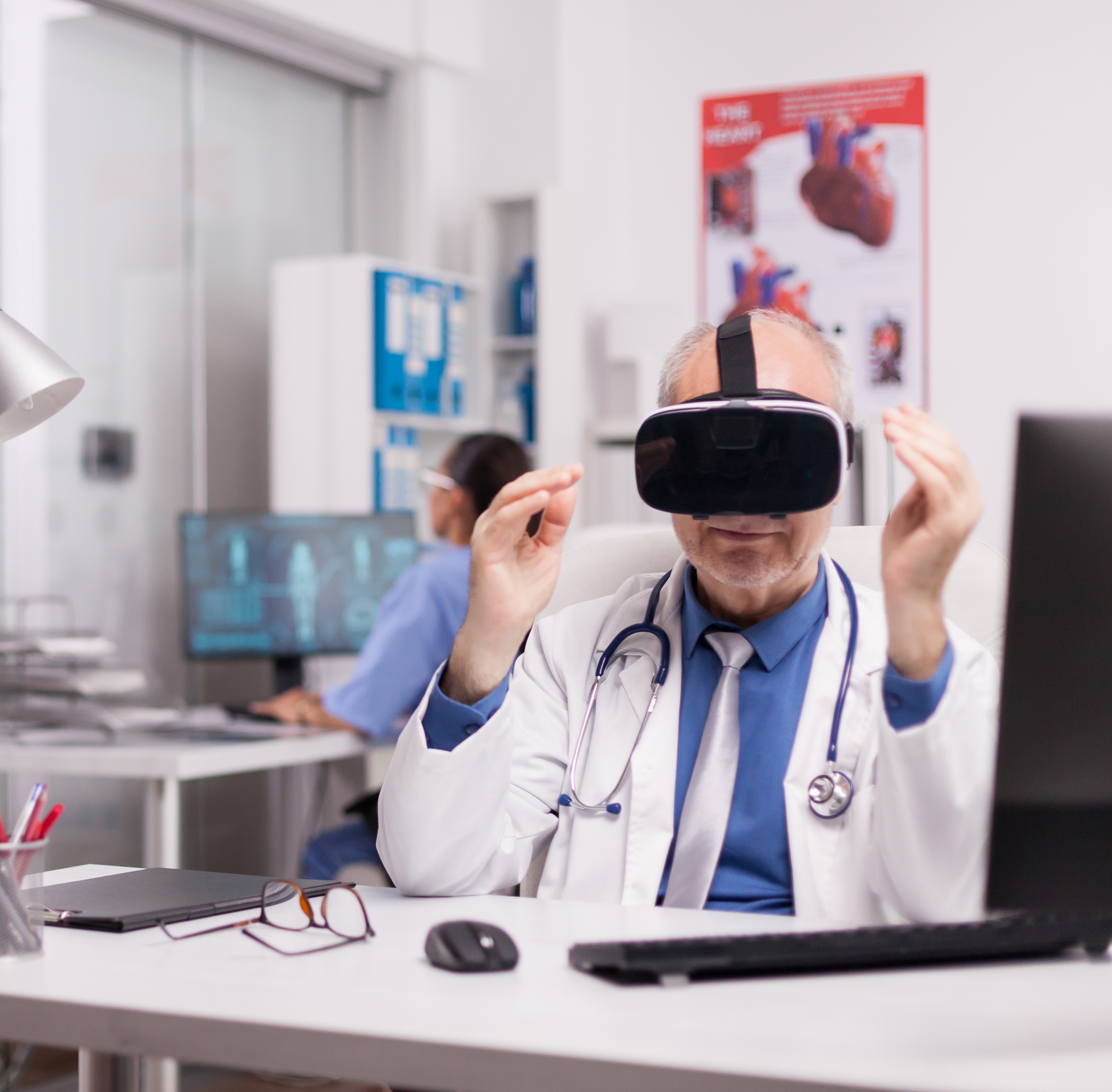Heart doctor wearing a virtual reality headset